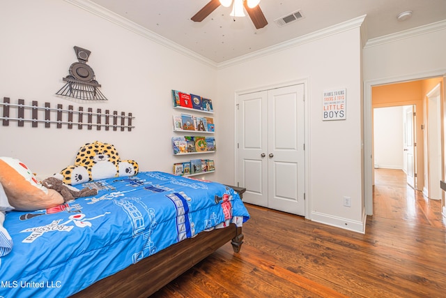 228 Falls Xing, Madison, MS 39110 - bedroom with crown molding, wood finished floors, a closet, baseboards, and ceiling fan