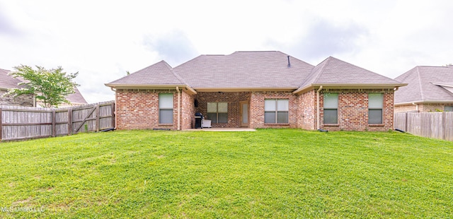 228 Falls Xing, Madison, MS 39110 - rear view of house featuring brick siding, a patio area, and roof with shingles