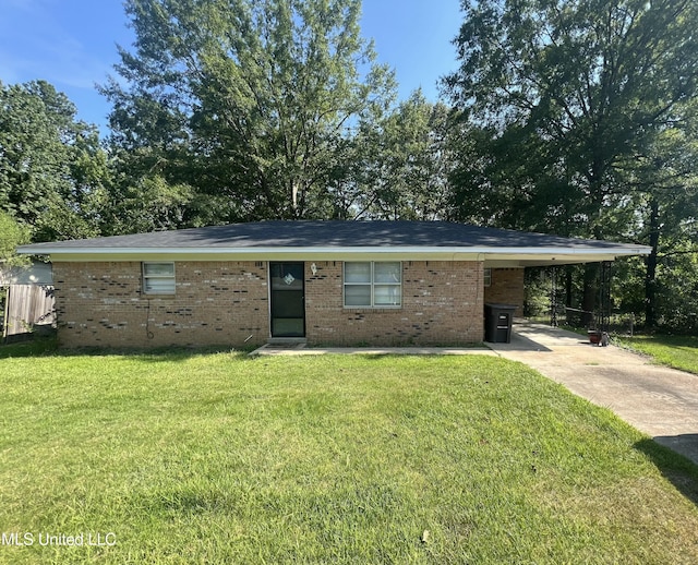 ranch-style home with a carport and a front yard