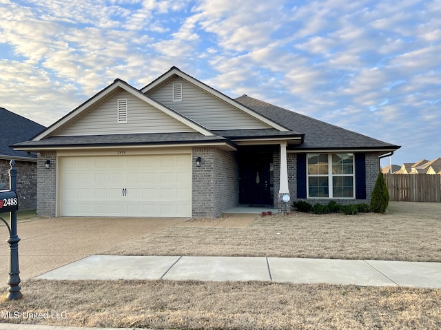 view of front of property with a garage