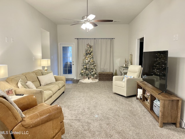 living room with carpet flooring and ceiling fan