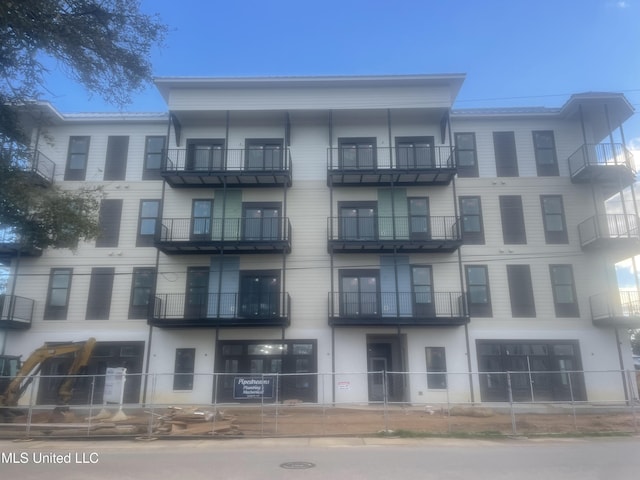 124 Court St Unit 305, Bay Saint Louis, MS 39520 - view of property with fence