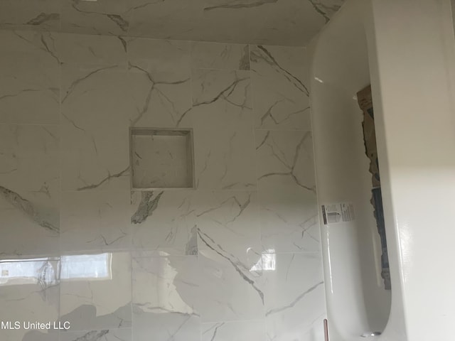 details with a marble finish shower