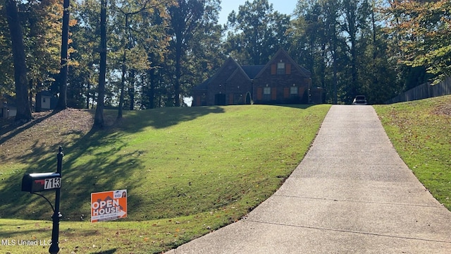 view of front of home with a front lawn