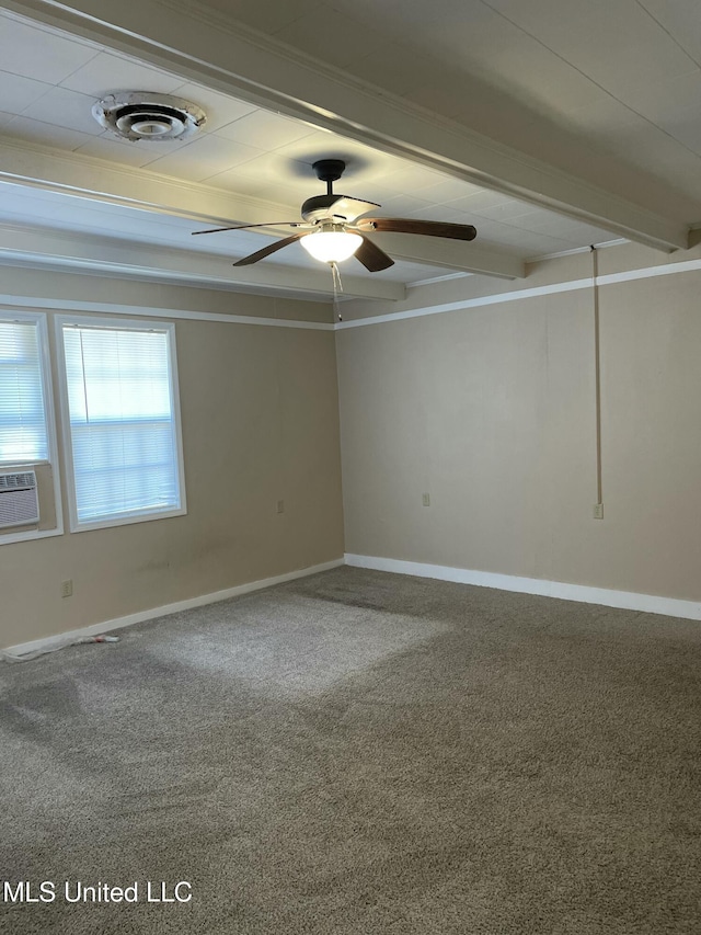 unfurnished room featuring a ceiling fan, carpet, visible vents, baseboards, and beamed ceiling