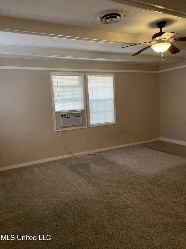 empty room with visible vents, baseboards, ceiling fan, carpet flooring, and cooling unit