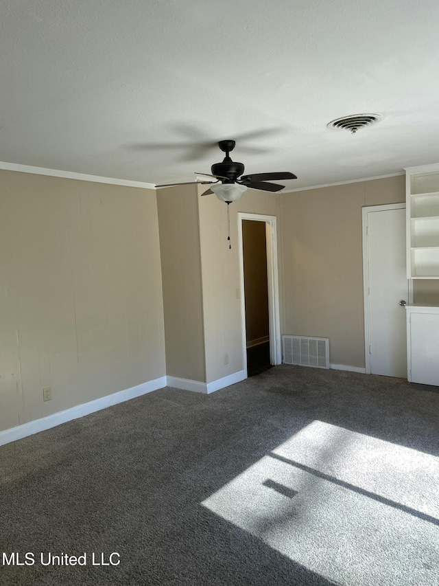 unfurnished bedroom featuring a ceiling fan, carpet, visible vents, and baseboards