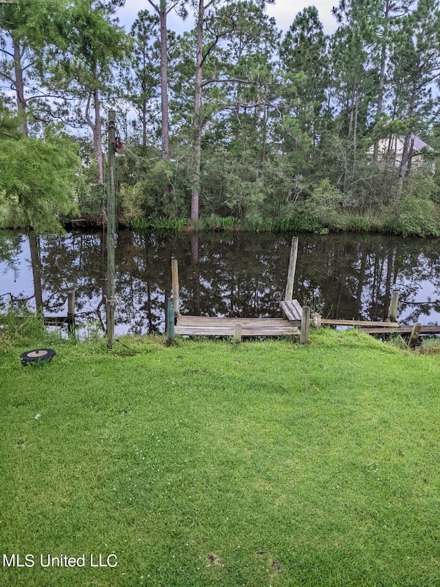 4021 Sailfish St, Bay Saint Louis, MS 39520 - dock area with a yard and a water view