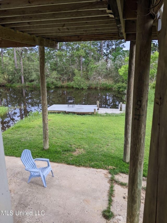 4021 Sailfish St, Bay Saint Louis, MS 39520 - view of patio featuring a water view and a dock