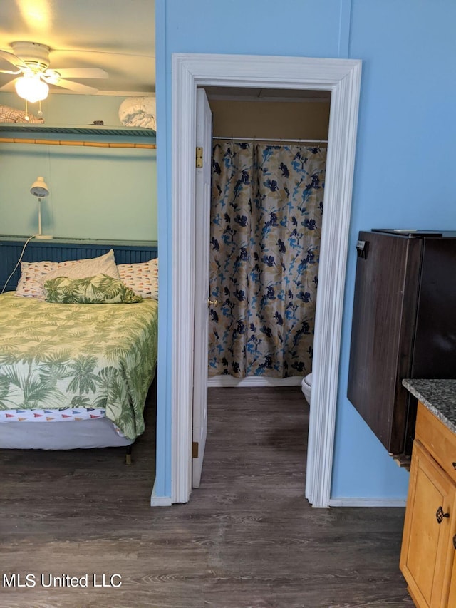 4021 Sailfish St, Bay Saint Louis, MS 39520 - bedroom with dark wood-type flooring and baseboards