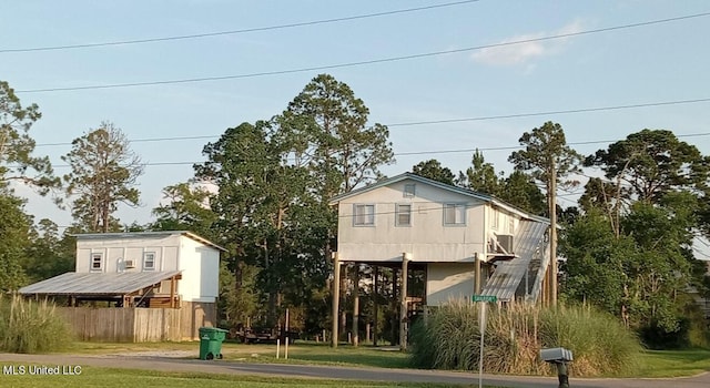 4021 Sailfish St, Bay Saint Louis, MS 39520 - rear view of property with a yard