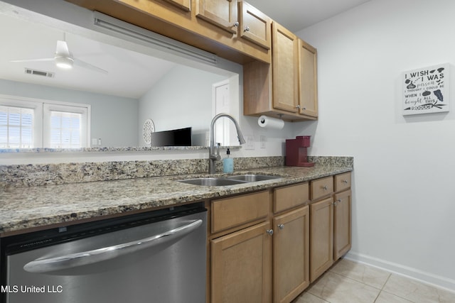 kitchen featuring visible vents, stainless steel dishwasher, a sink, ceiling fan, and light stone countertops