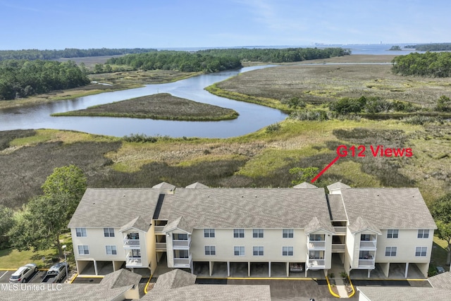 bird's eye view with a water view