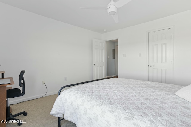 bedroom with ceiling fan, carpet flooring, and baseboards