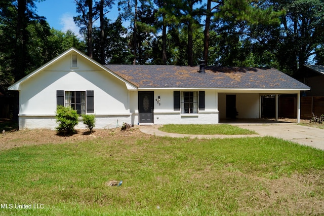 single story home featuring a front yard and a carport