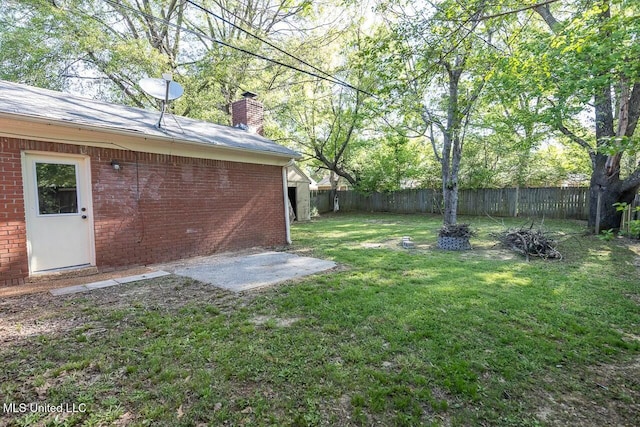 view of yard featuring a fenced backyard