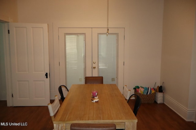 unfurnished dining area featuring dark hardwood / wood-style floors