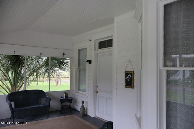 interior space featuring vaulted ceiling