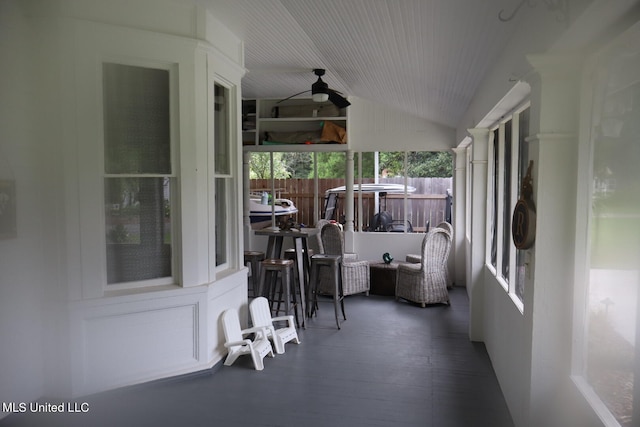 sunroom / solarium with lofted ceiling