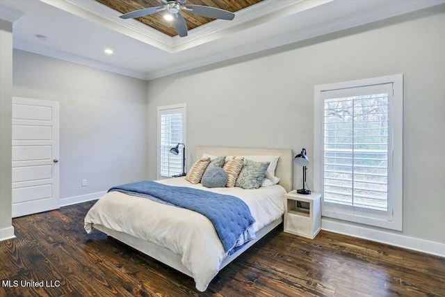 bedroom featuring a raised ceiling, ceiling fan, dark hardwood / wood-style flooring, and crown molding