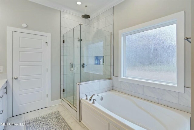 bathroom with tile patterned floors, crown molding, vanity, and shower with separate bathtub