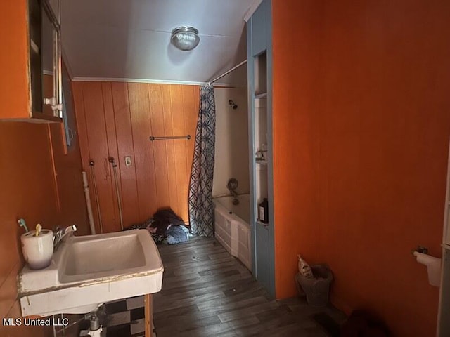 221 N W St, Mendenhall, MS 39114 - full bathroom featuring shower / bath combination with curtain and wood finished floors