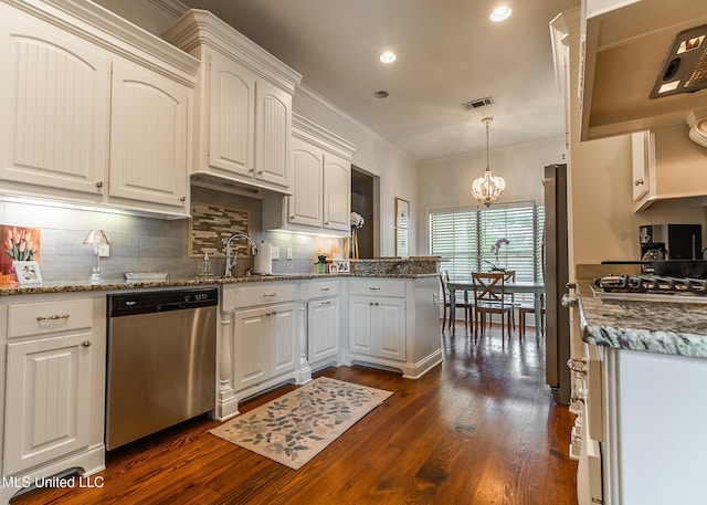 124 Westerly Pl, Madison, MS 39110 - kitchen with appliances with stainless steel finishes, a sink, dark wood-type flooring, backsplash, and recessed lighting