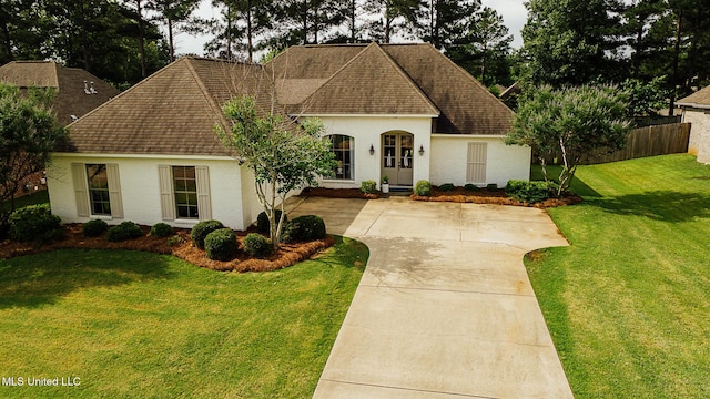 124 Westerly Pl, Madison, MS 39110 - view of front facade with a shingled roof, stucco siding, and concrete driveway