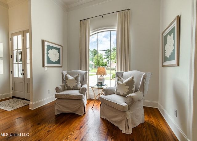 124 Westerly Pl, Madison, MS 39110 - living area featuring dark wood-style floors, crown molding, and baseboards