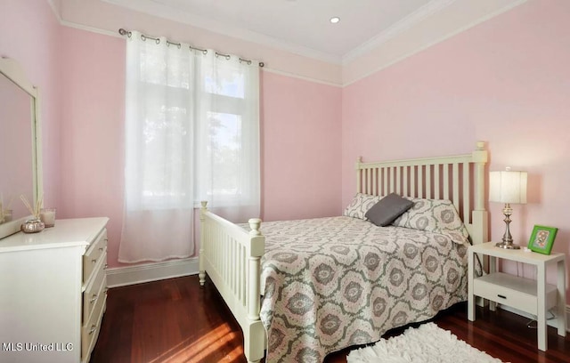 bedroom with ornamental molding, wood finished floors, and recessed lighting