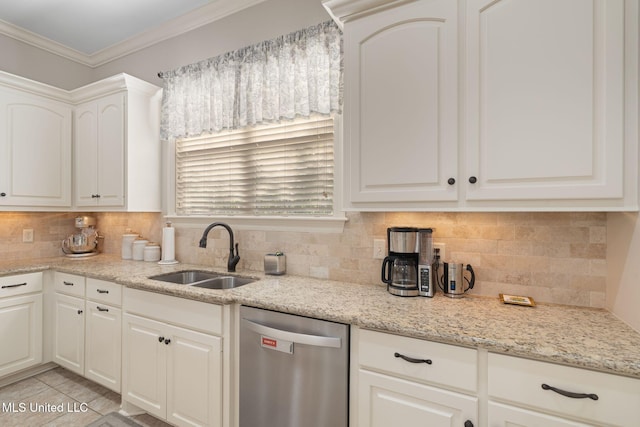 kitchen with white cabinets, tasteful backsplash, crown molding, sink, and dishwasher