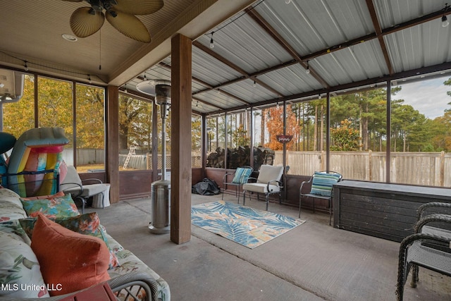 sunroom / solarium with ceiling fan and a wealth of natural light