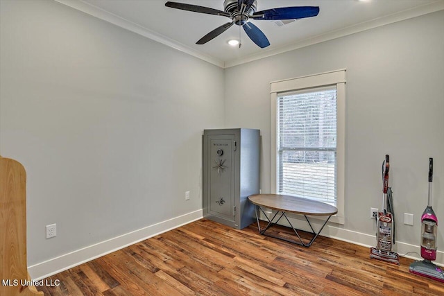 miscellaneous room with crown molding, hardwood / wood-style flooring, and ceiling fan