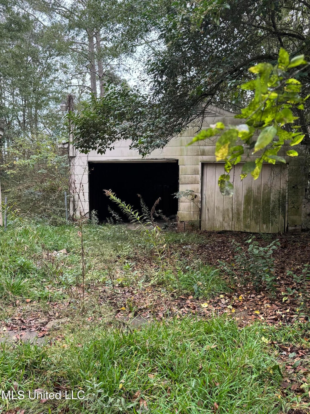 view of outbuilding with a garage