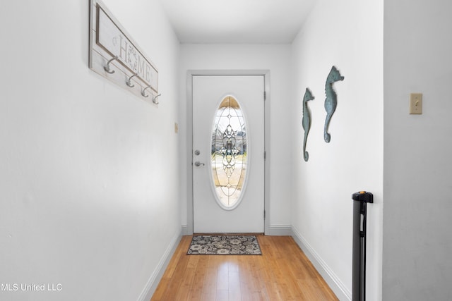 doorway to outside with hardwood / wood-style floors