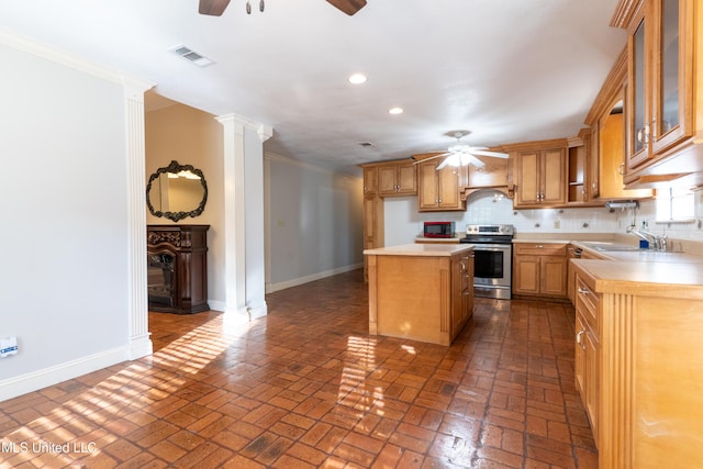 kitchen featuring stainless steel electric stove, a ceiling fan, recessed lighting, baseboards, and brick floors