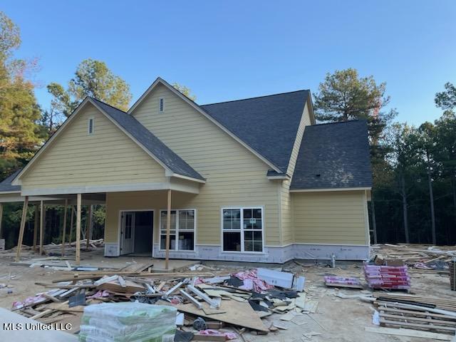 rear view of house with a patio area