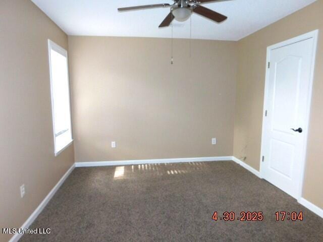 5881 Morganton Dr, Olive Branch, MS 38654 - carpeted spare room with ceiling fan and baseboards