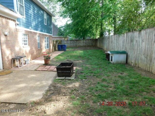 5881 Morganton Dr, Olive Branch, MS 38654 - view of yard with a patio and a fenced backyard