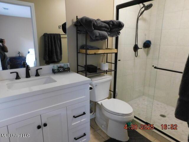 5881 Morganton Dr, Olive Branch, MS 38654 - bathroom with toilet, a shower stall, and vanity