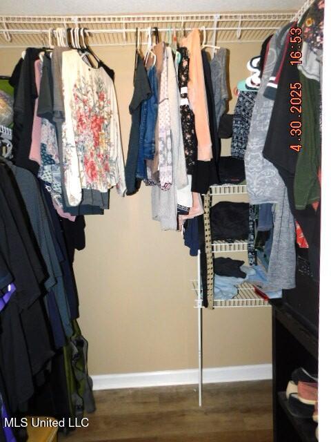 5881 Morganton Dr, Olive Branch, MS 38654 - spacious closet featuring wood finished floors