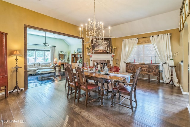 3831 Lake Village Cv, Olive Branch, MS 38654 - dining area with lofted ceiling, wood finished floors, a chandelier, and ceiling fan