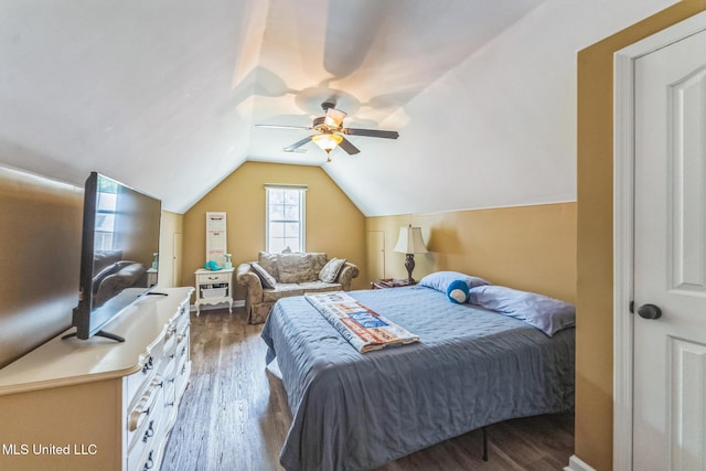 3831 Lake Village Cv, Olive Branch, MS 38654 - bedroom with wood finished floors, vaulted ceiling, and a ceiling fan