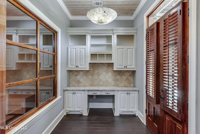 101 Commons Pl, Ridgeland, MS 39157 - unfurnished office with visible vents, baseboards, built in study area, ornamental molding, and dark wood-style floors
