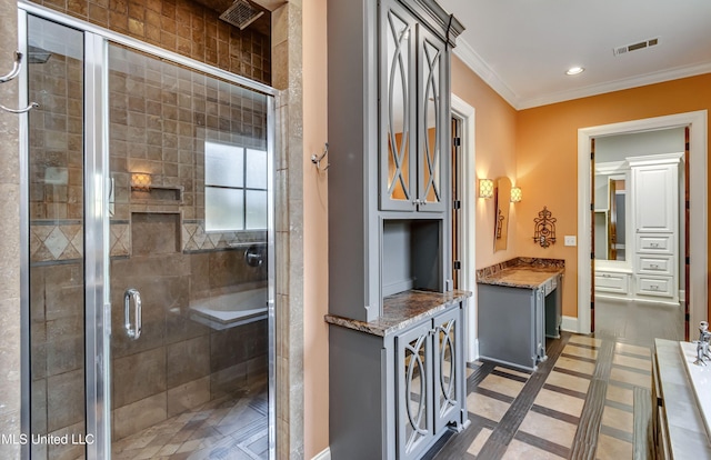 101 Commons Pl, Ridgeland, MS 39157 - bathroom featuring ornamental molding, visible vents, recessed lighting, a stall shower, and baseboards