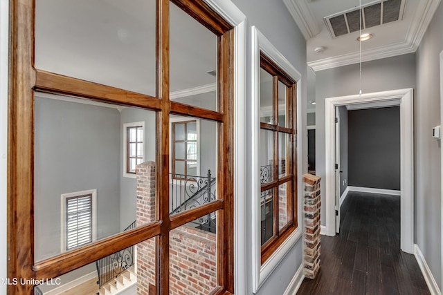 101 Commons Pl, Ridgeland, MS 39157 - hallway with attic access, baseboards, visible vents, crown molding, and dark wood-type flooring