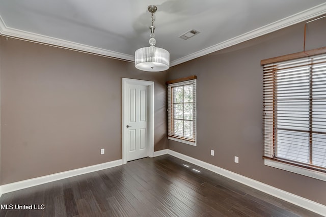 101 Commons Pl, Ridgeland, MS 39157 - empty room featuring crown molding, dark wood finished floors, visible vents, and baseboards