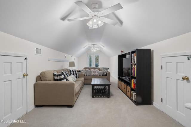 living room featuring light carpet, ceiling fan, and vaulted ceiling