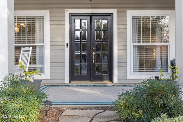 property entrance featuring french doors