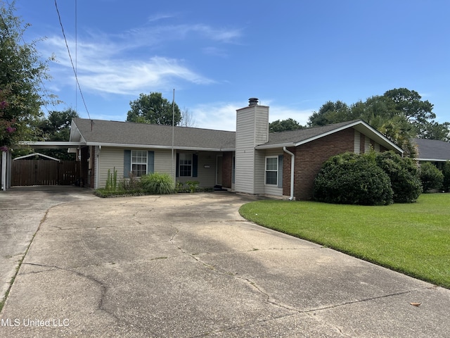 2 Concord Pl, Gulfport, MS 39507 - single story home with driveway, a chimney, brick siding, a carport, and roof with shingles